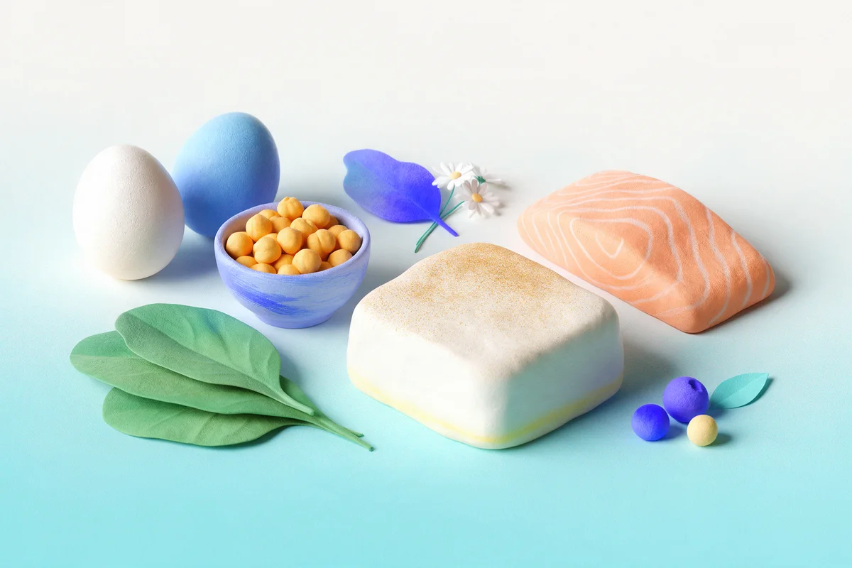 Poisson, tofu, pois chiches et œufs dans une illustration bleue